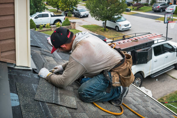 Professional Roofing technician working in Durham, ME